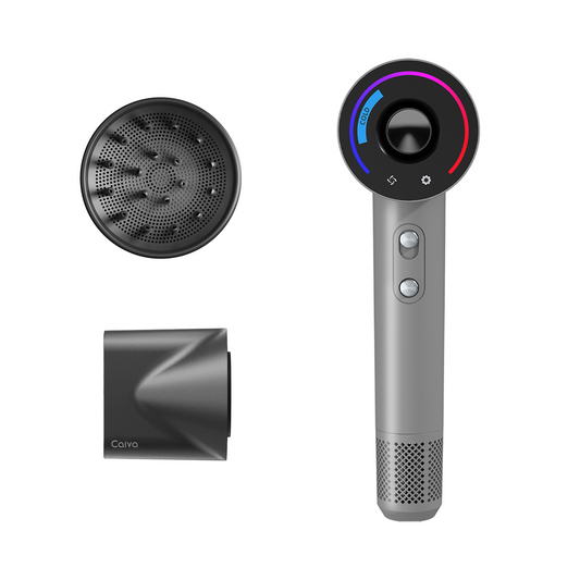 Gray handheld device with attachments on a white background