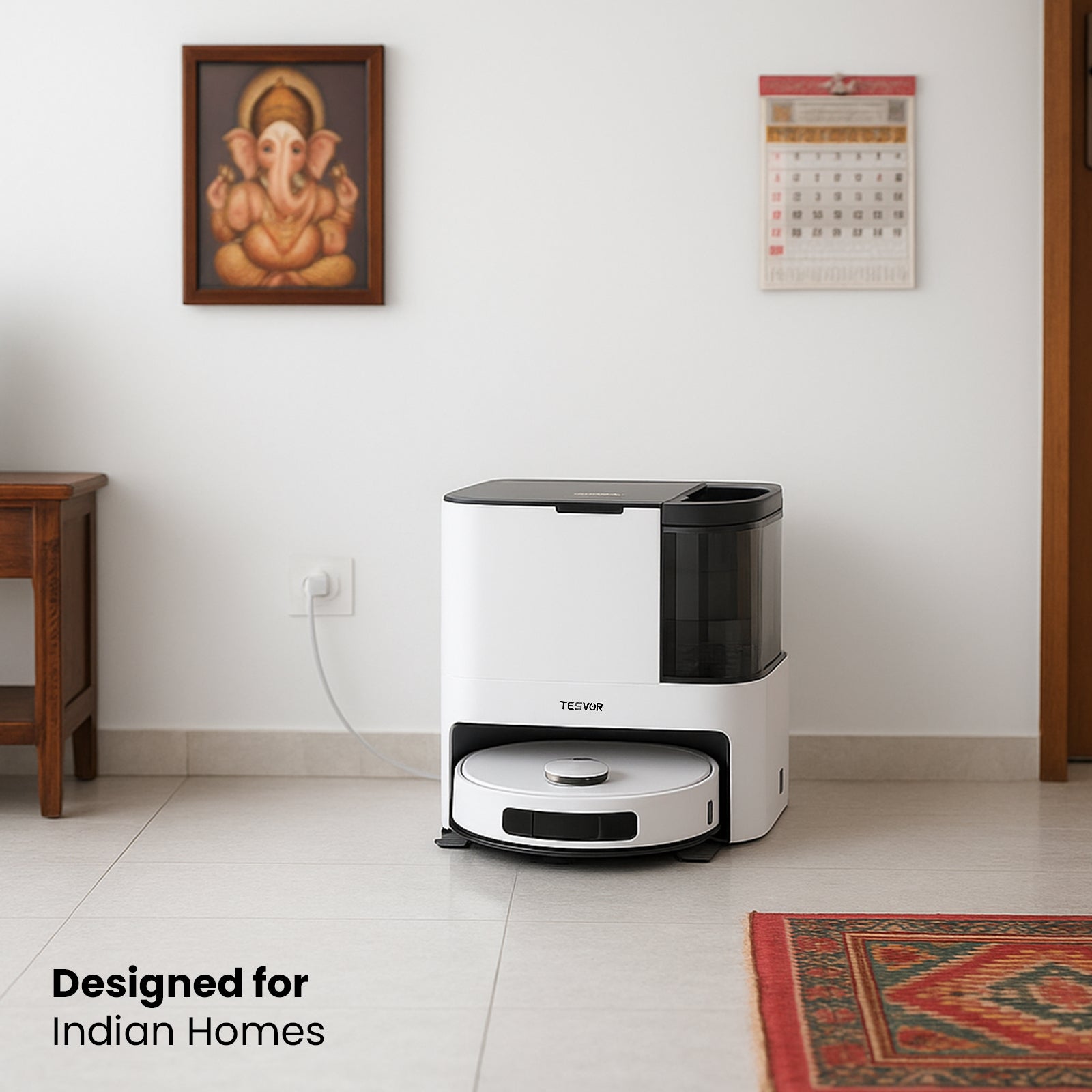 Robotic vacuum cleaner in a room with a wall painting and calendar.