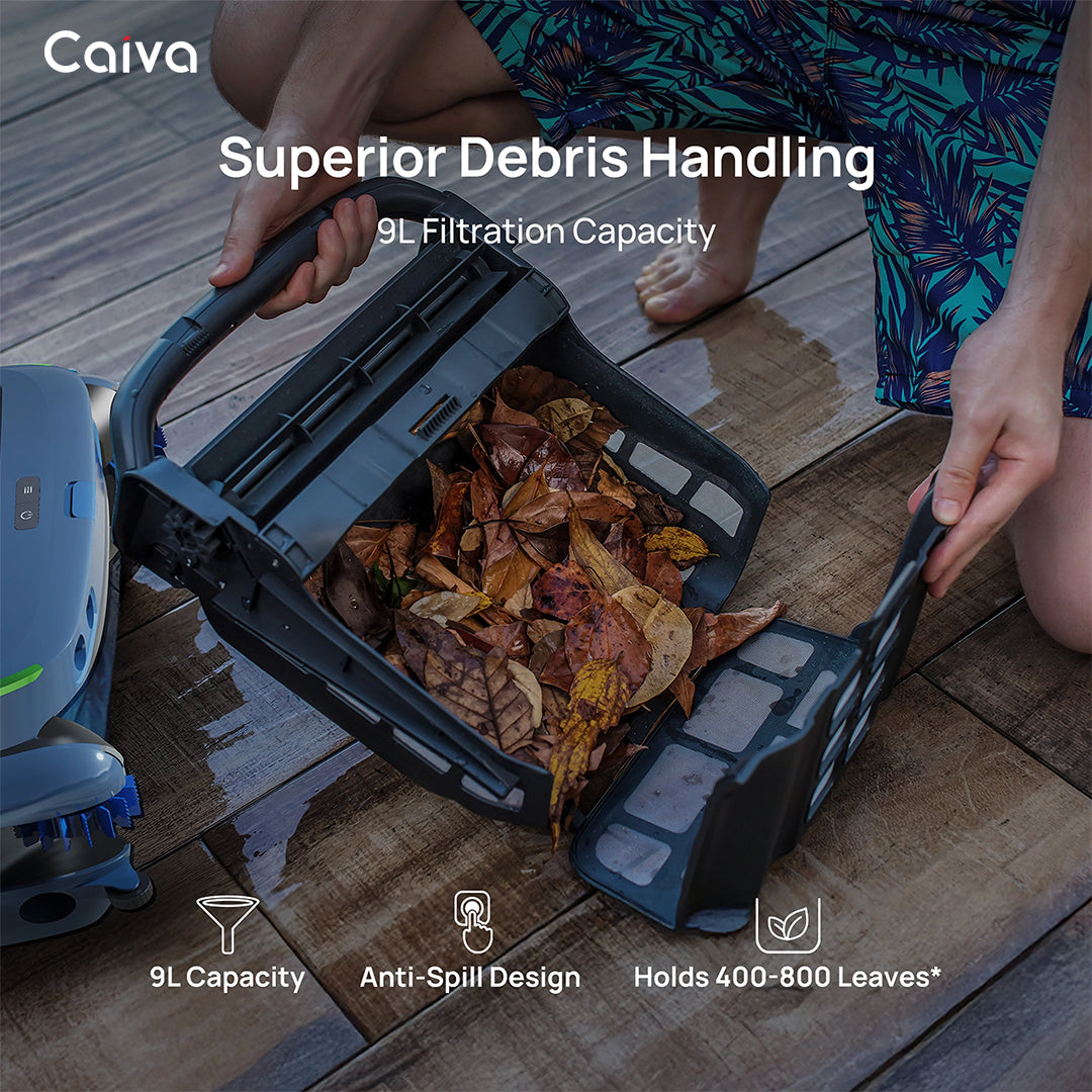 Person using a Caiva debris collection bin filled with leaves on a wooden deck.